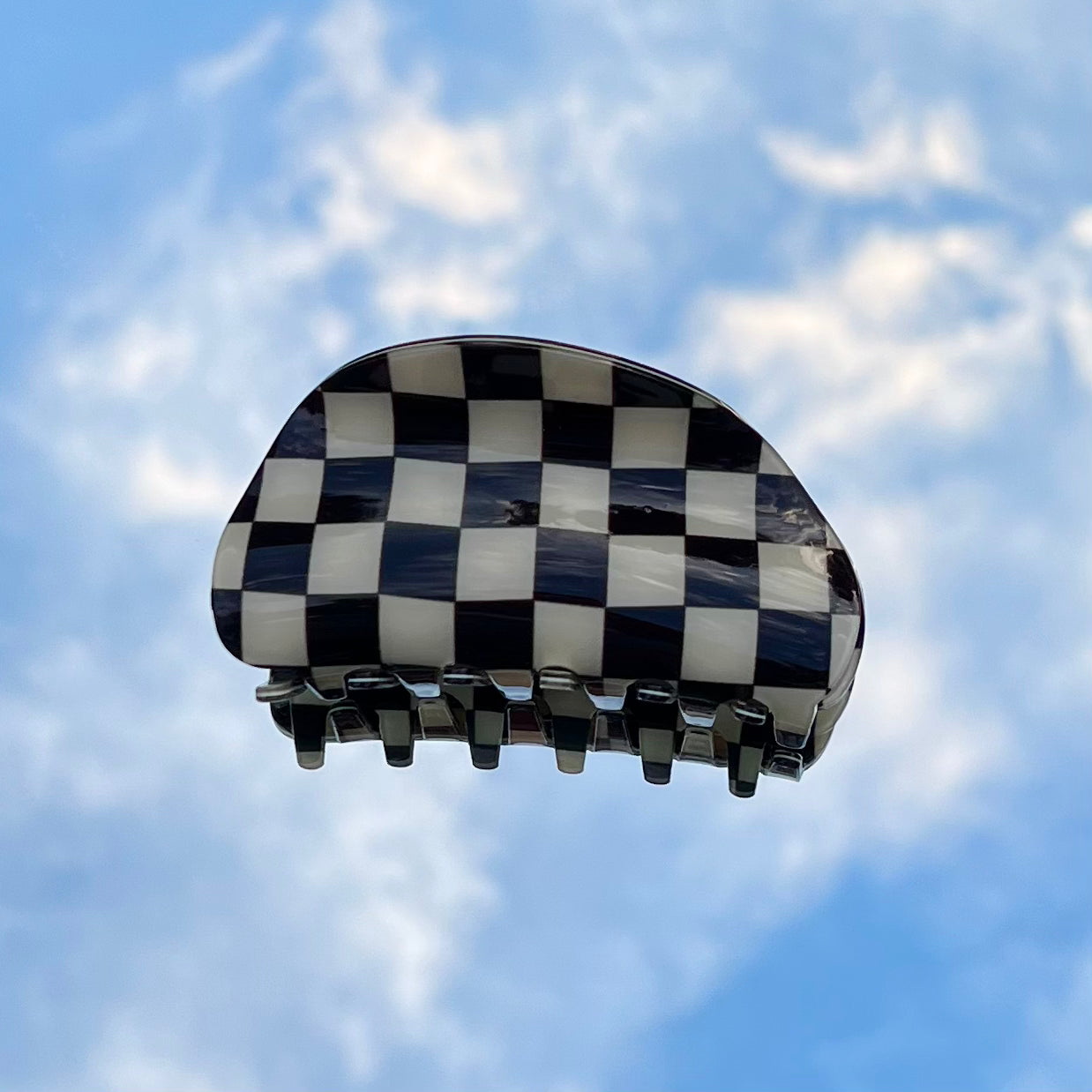 emilia clip in black checkers